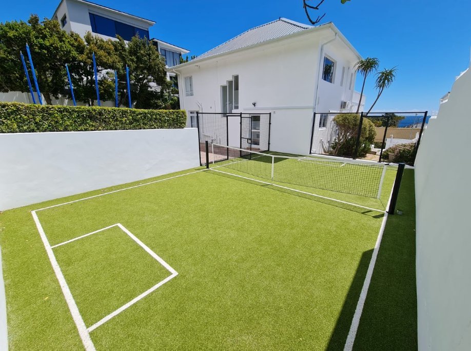 Walled Astro Turf court at a private residence — suited to football and futsal use