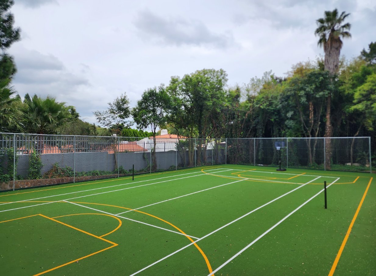 Astro Turf hard court installation at a private residence — multi-line surface