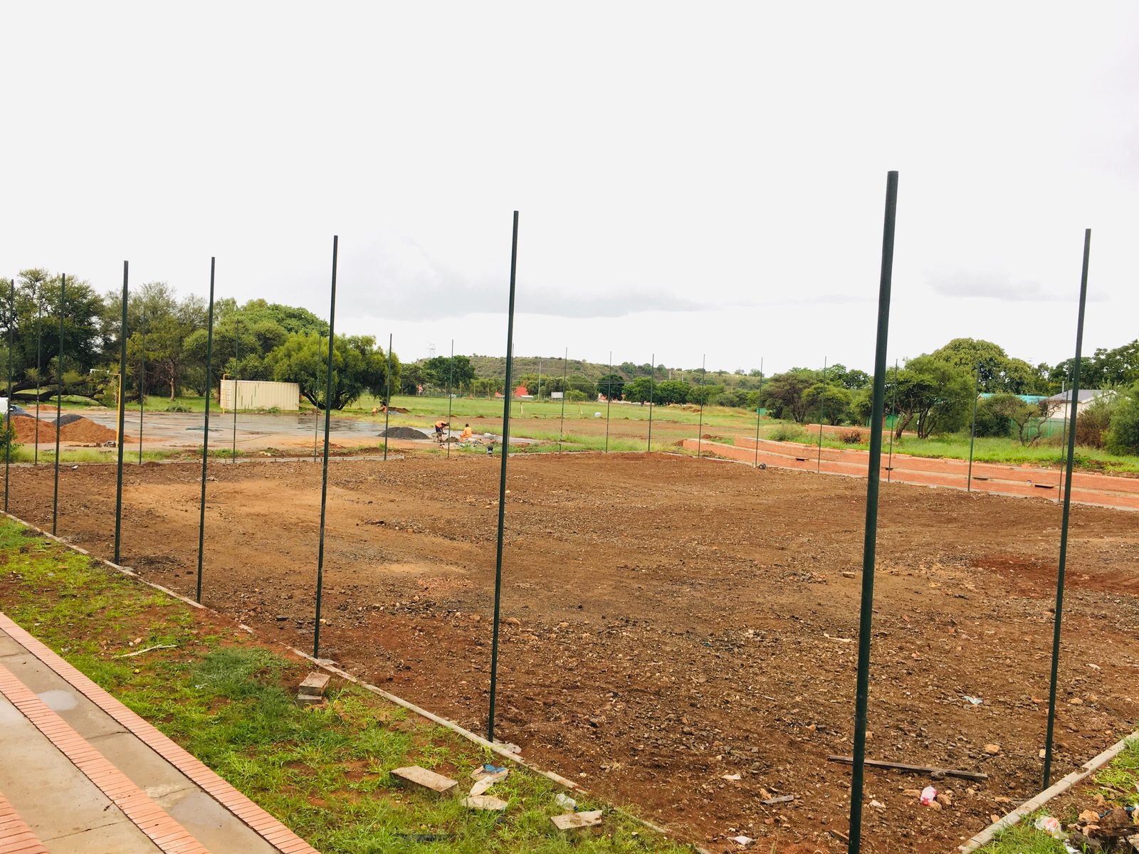 Kimberley Girls&rsquo; High School fencing — vertical posts being installed across the perimeter