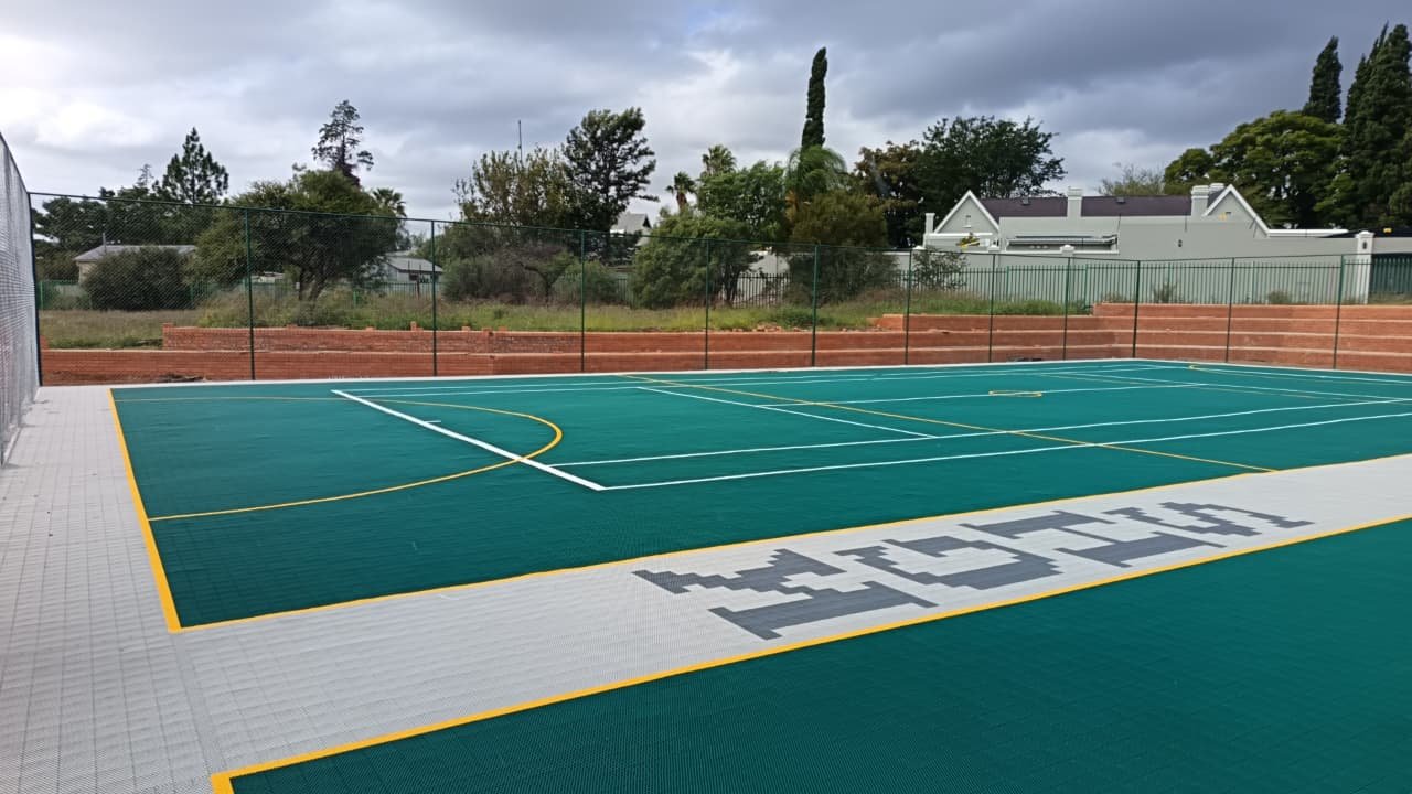 Kimberley Girls&rsquo; High School InterLock Tiling — KGHS school logo integrated into the court surface